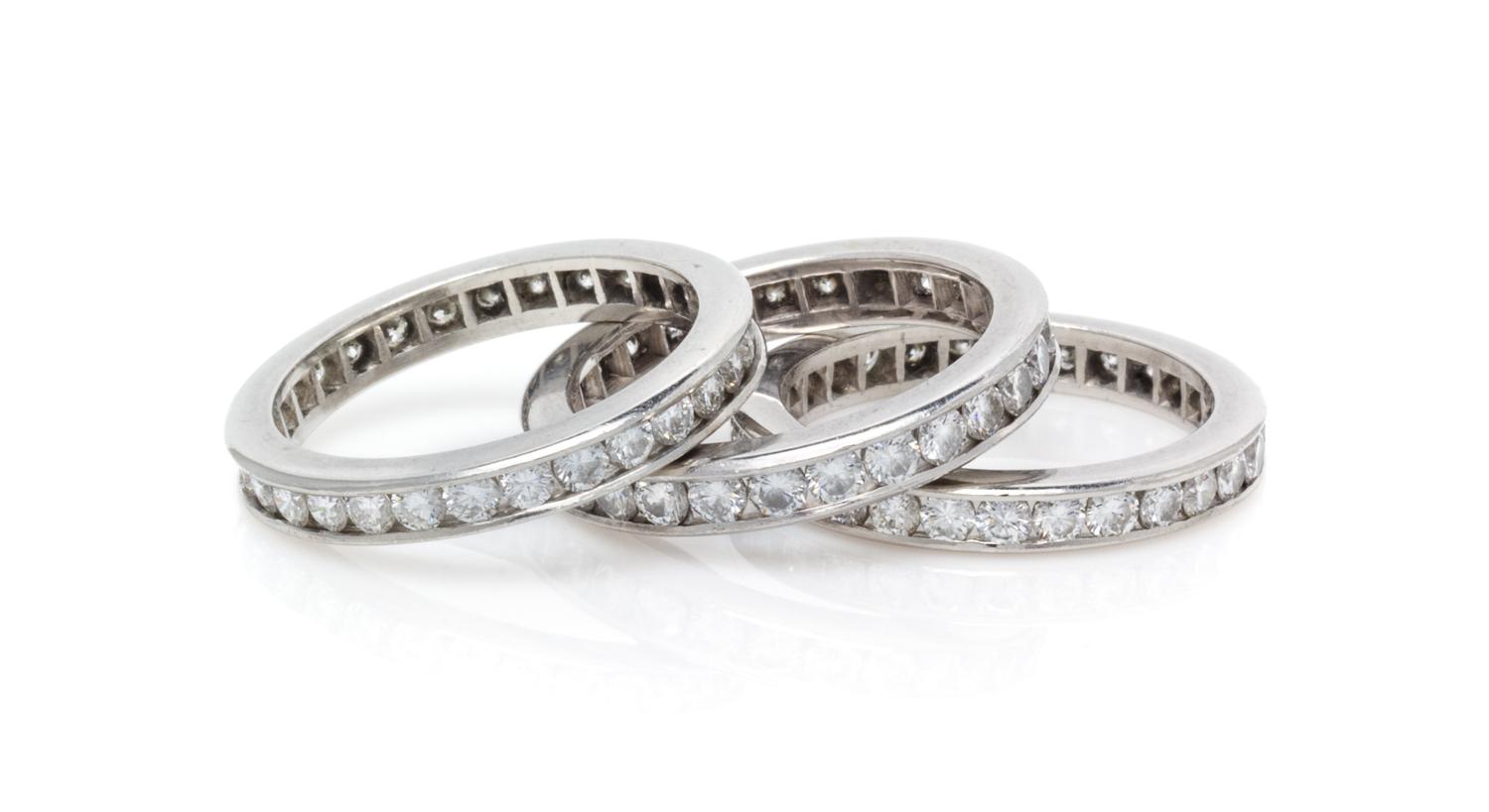 A Collection of Platinum and Diamond Eternity Bands, 9.70 dwts.