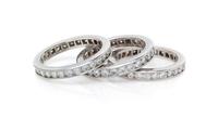 A Collection of Platinum and Diamond Eternity Bands, 9.70 dwts.