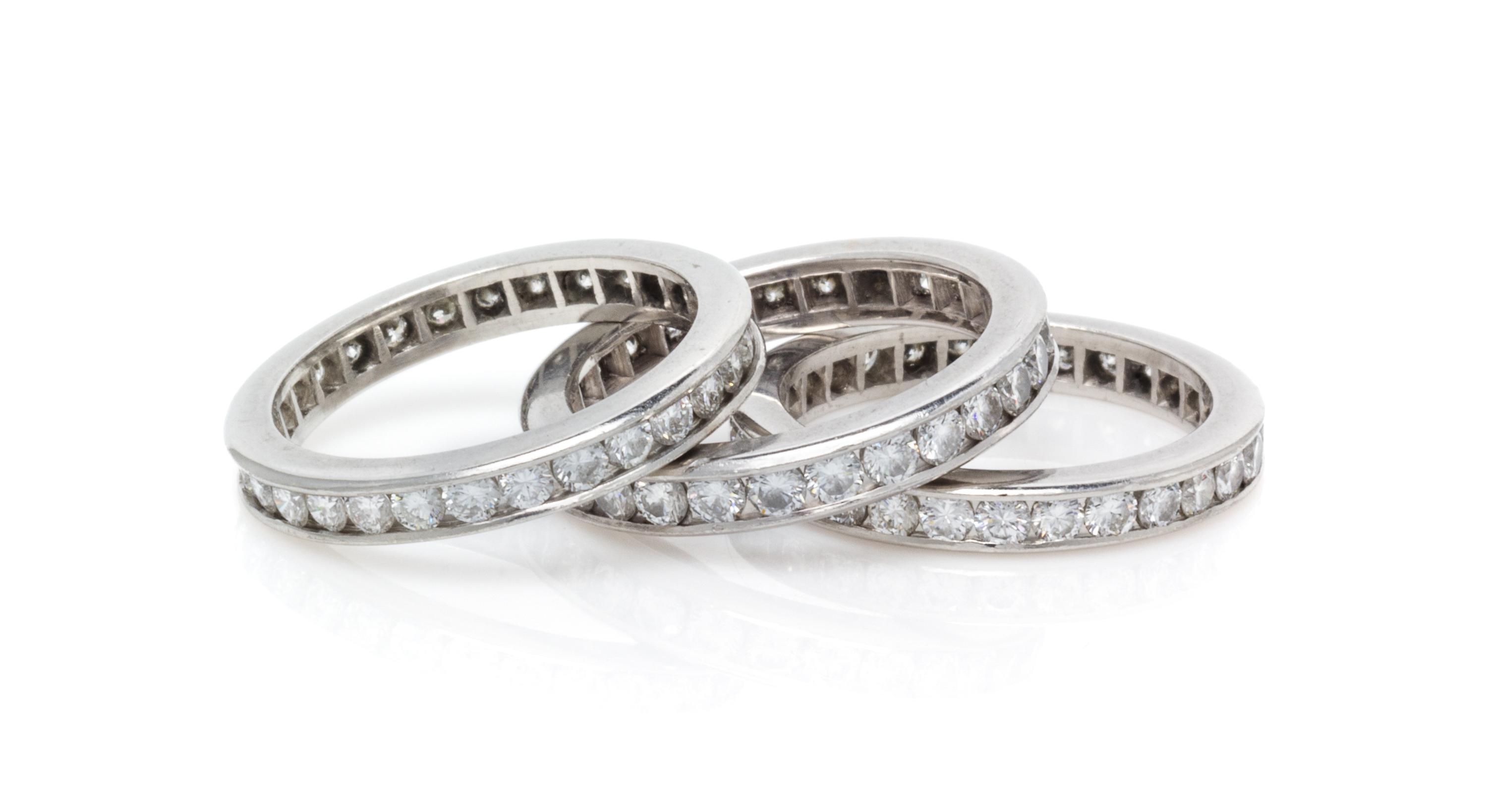 A Collection of Platinum and Diamond Eternity Bands, 9.70 dwts.