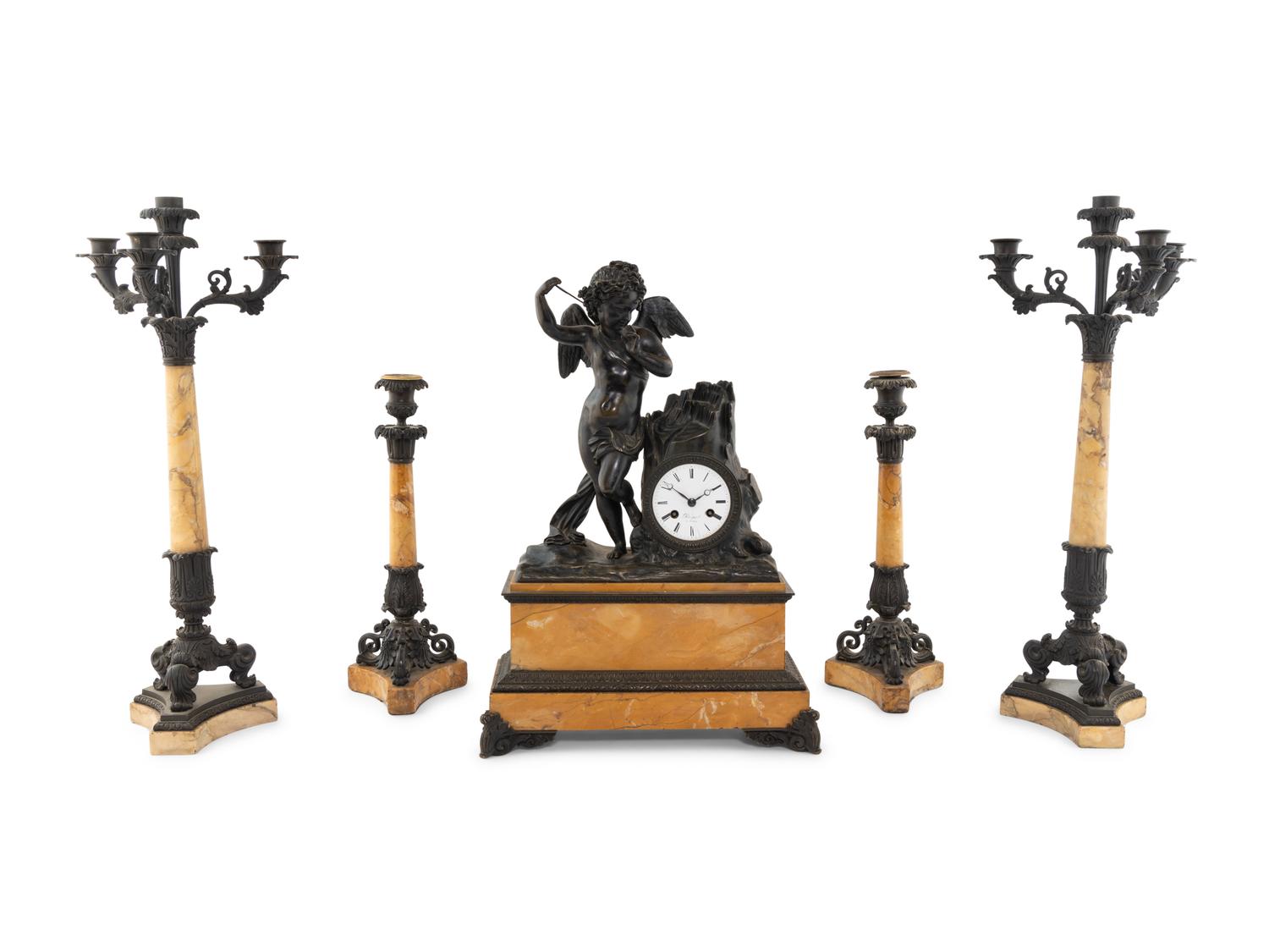 An Assembled French Marble and Bronze Five-Piece Clock Garniture