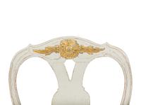 A Pair of Swedish White-Painted and Parcel-Gilt Open Armchairs