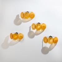 Group of Four Amber Glass Three-Light Wall Sconces