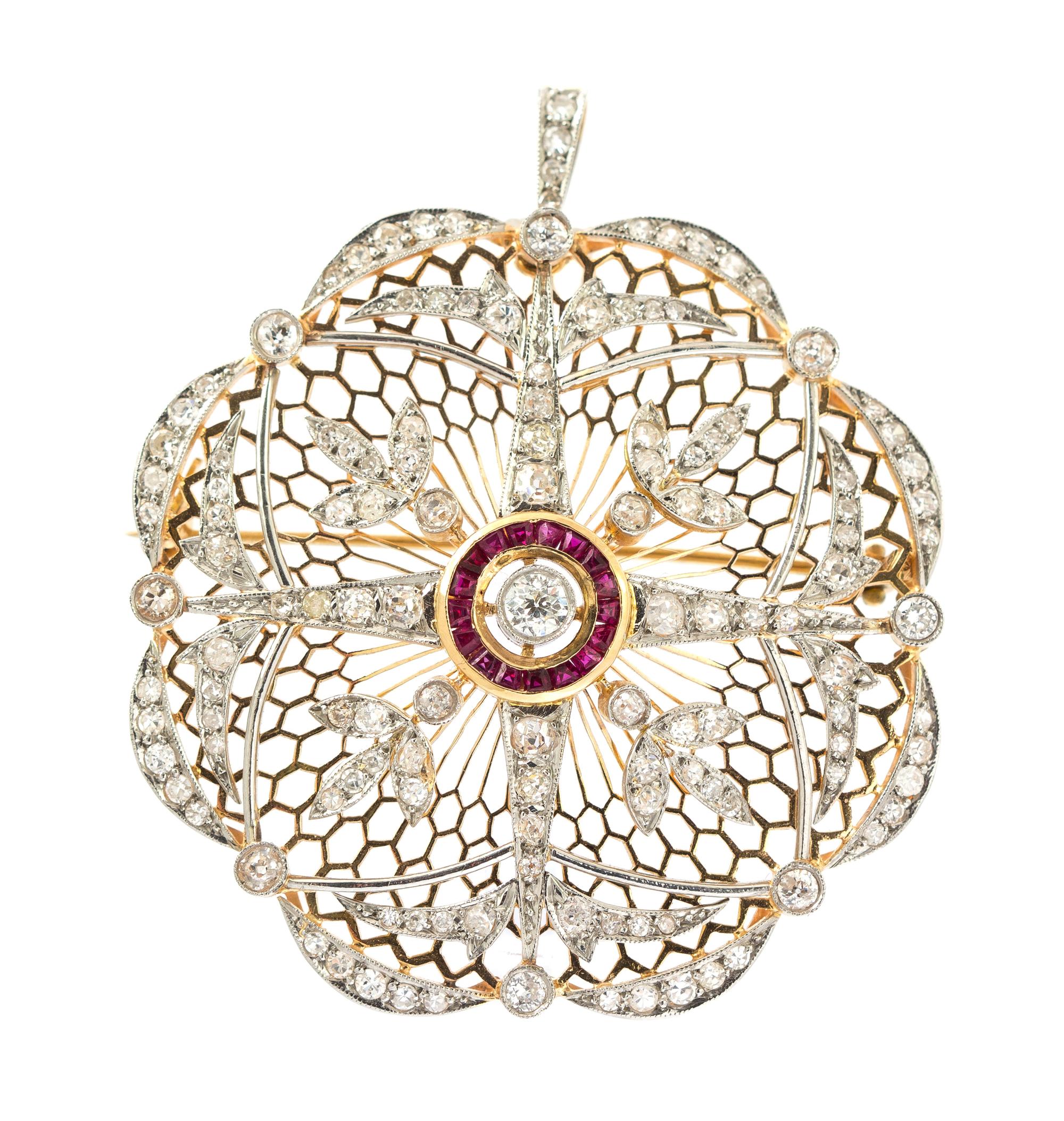 An Edwardian Platinum Topped Gold, Ruby and Diamond Pendant/Brooch, 10.90 dwts.