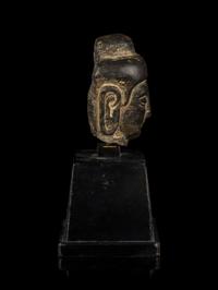 A Chinese Stone Carving of Buddha Head