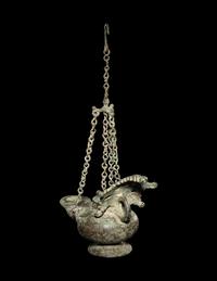 A Roman Bronze Oil Lamp