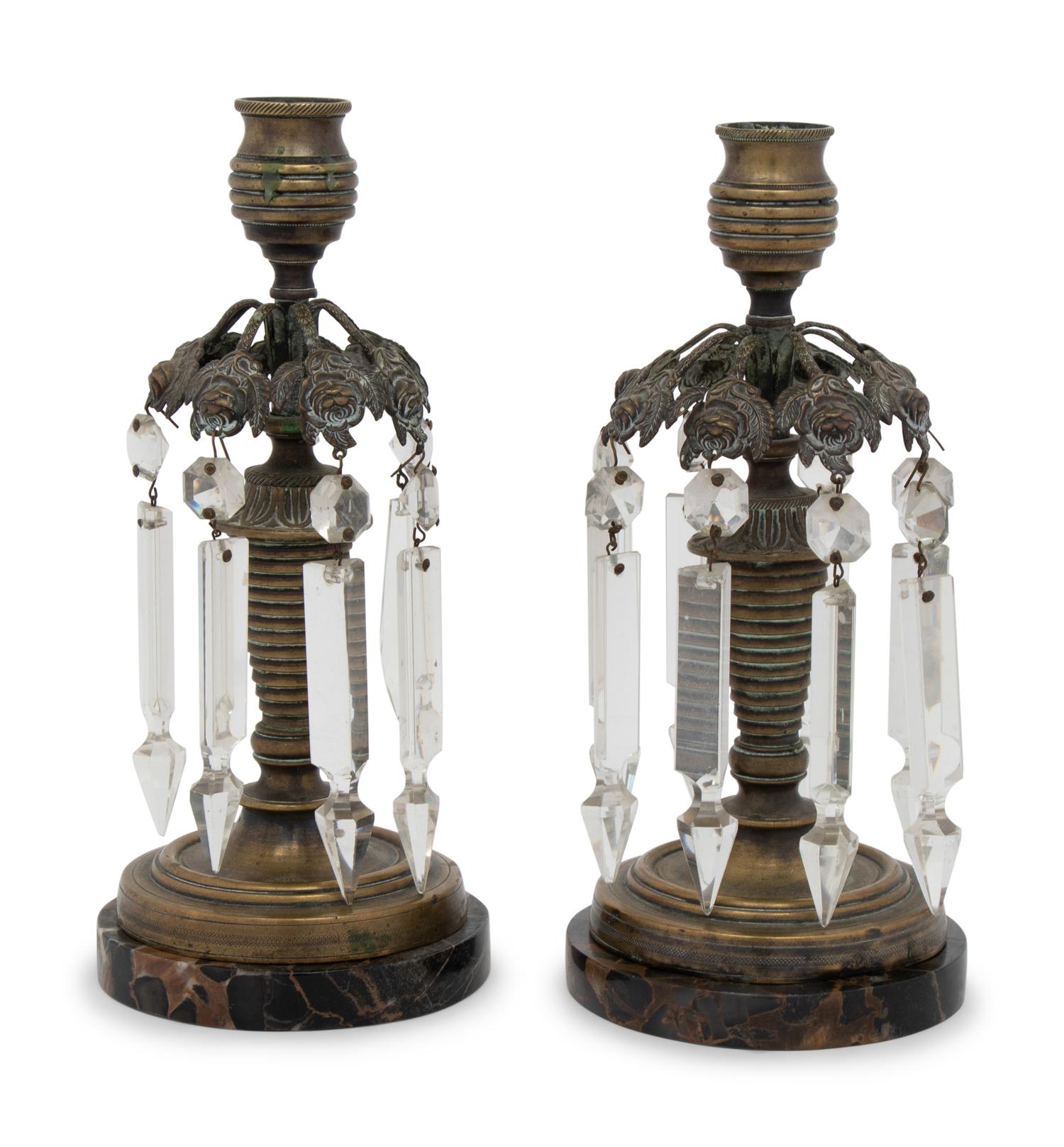 A Pair of Regency Style Gilt Metal and Glass Candlesticks
