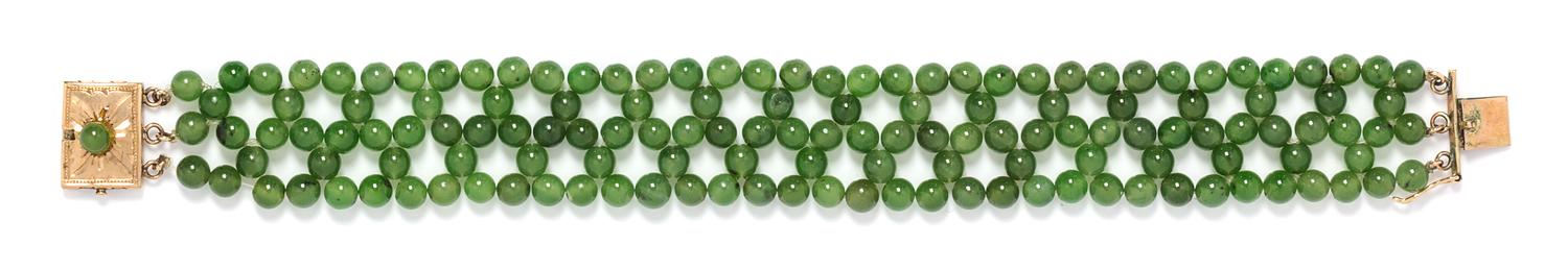 An 18 Karat Yellow Gold and Nephrite Jade Bracelet, 11.20 dwts.