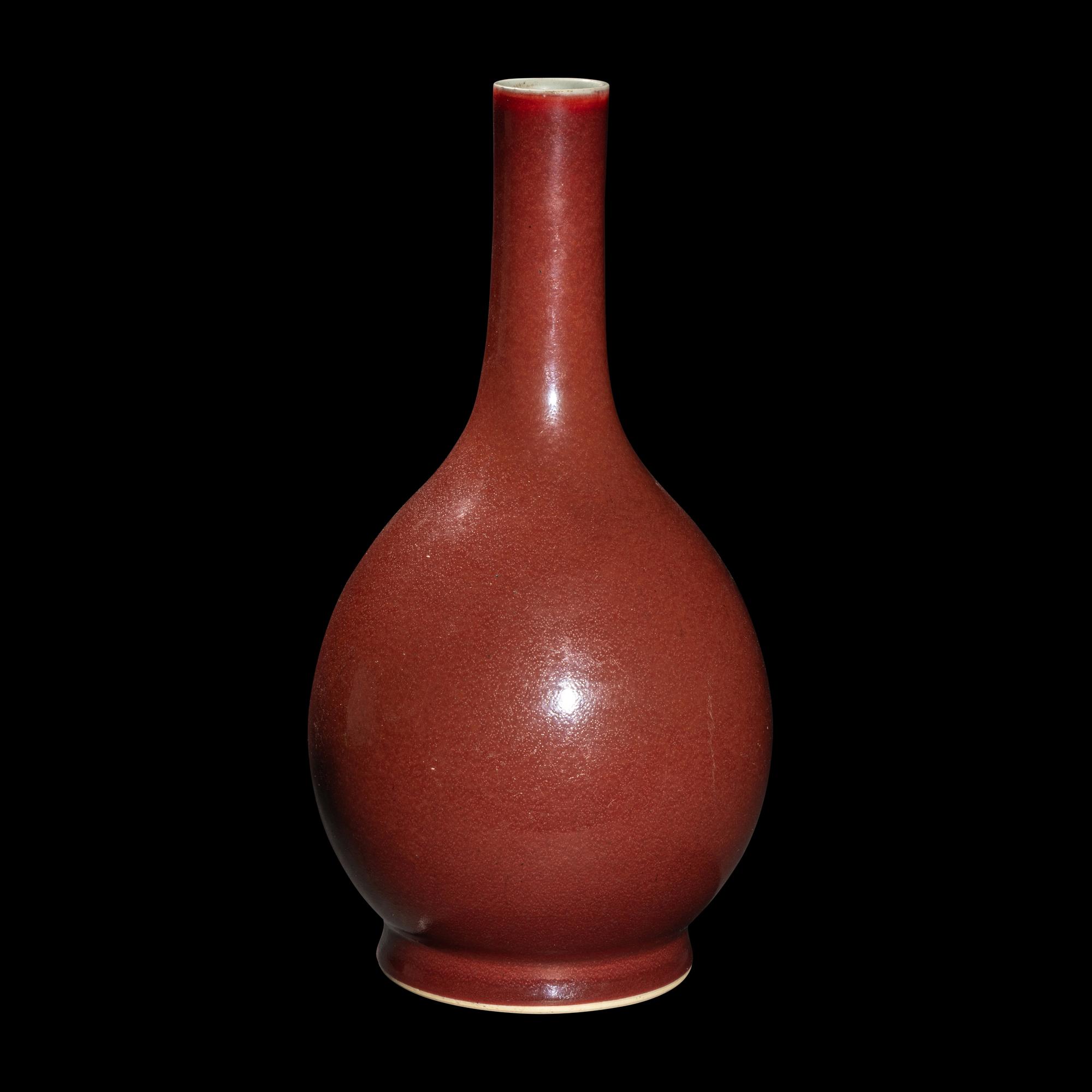 A Chinese Sang-de-Boeuf Glazed Porcelain Bottle Vase, 18th/19th Century 清中期 寶石紅釉賞瓶