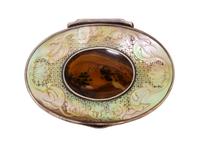 A Continental Silver, Abalone and Agate Inset Snuff Box, 19th/20th Century, of oval form, the abalone lid carved with floral and shell