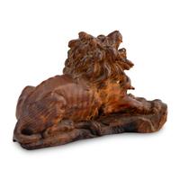 A Carved Oak Model of a Lion