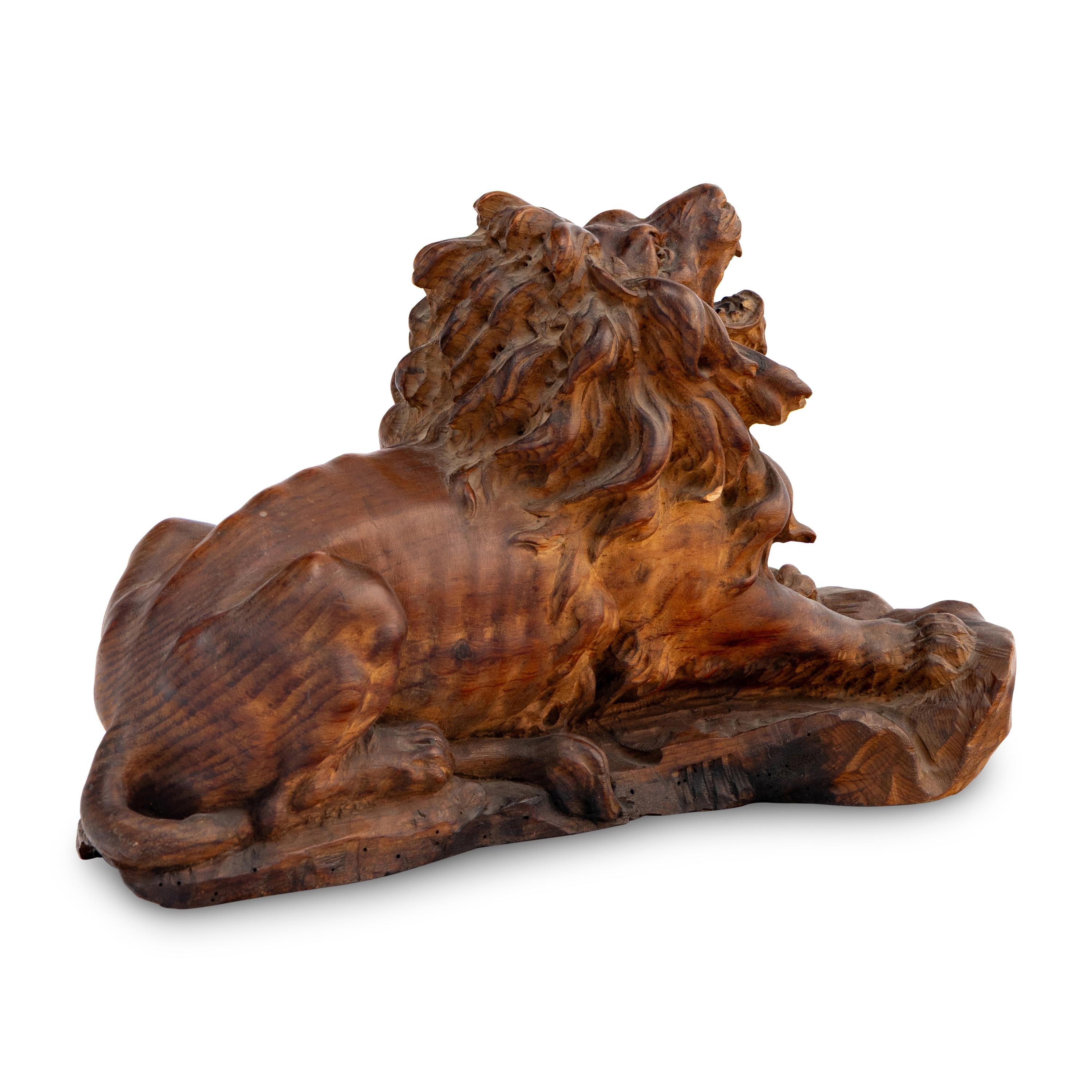 A Carved Oak Model of a Lion