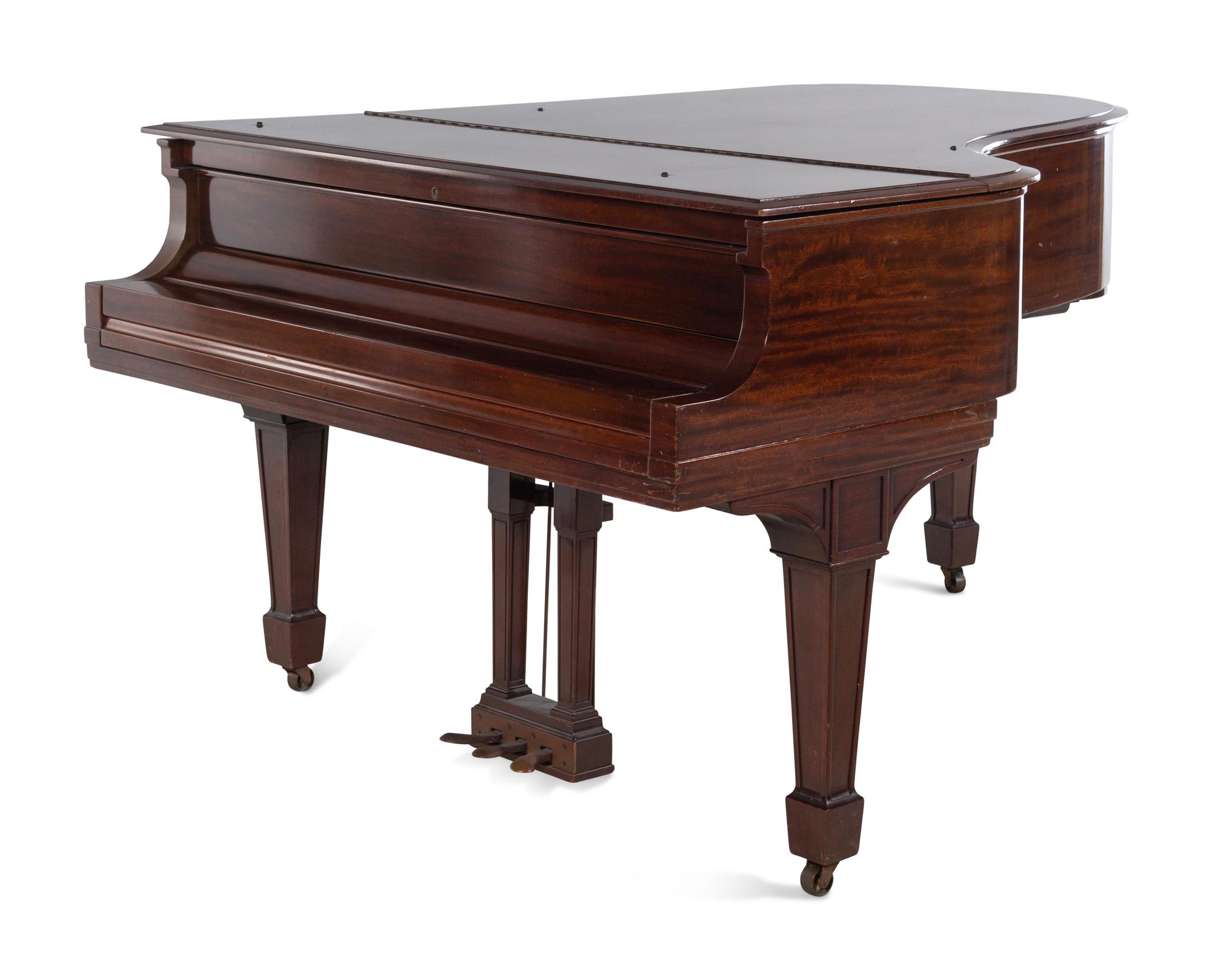 A Steinway and Sons Walnut Grand Piano and Bench