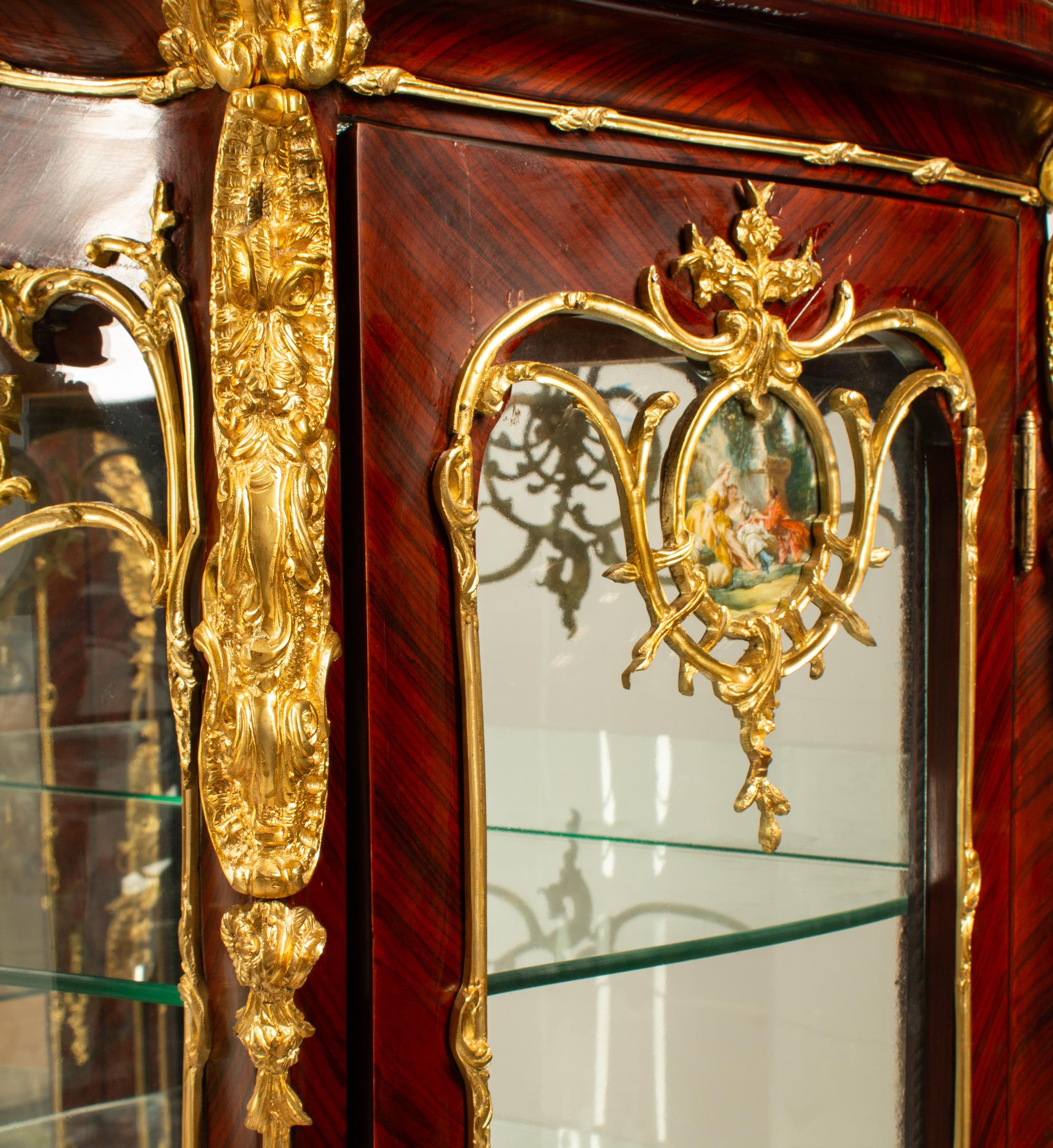 A Pair of Louis XV Style Gilt Bronze Mounted Vitrine Cabinets