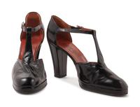 One Yves Saint Laurent and One Givenchy Pair of Shoes, 1970-80s