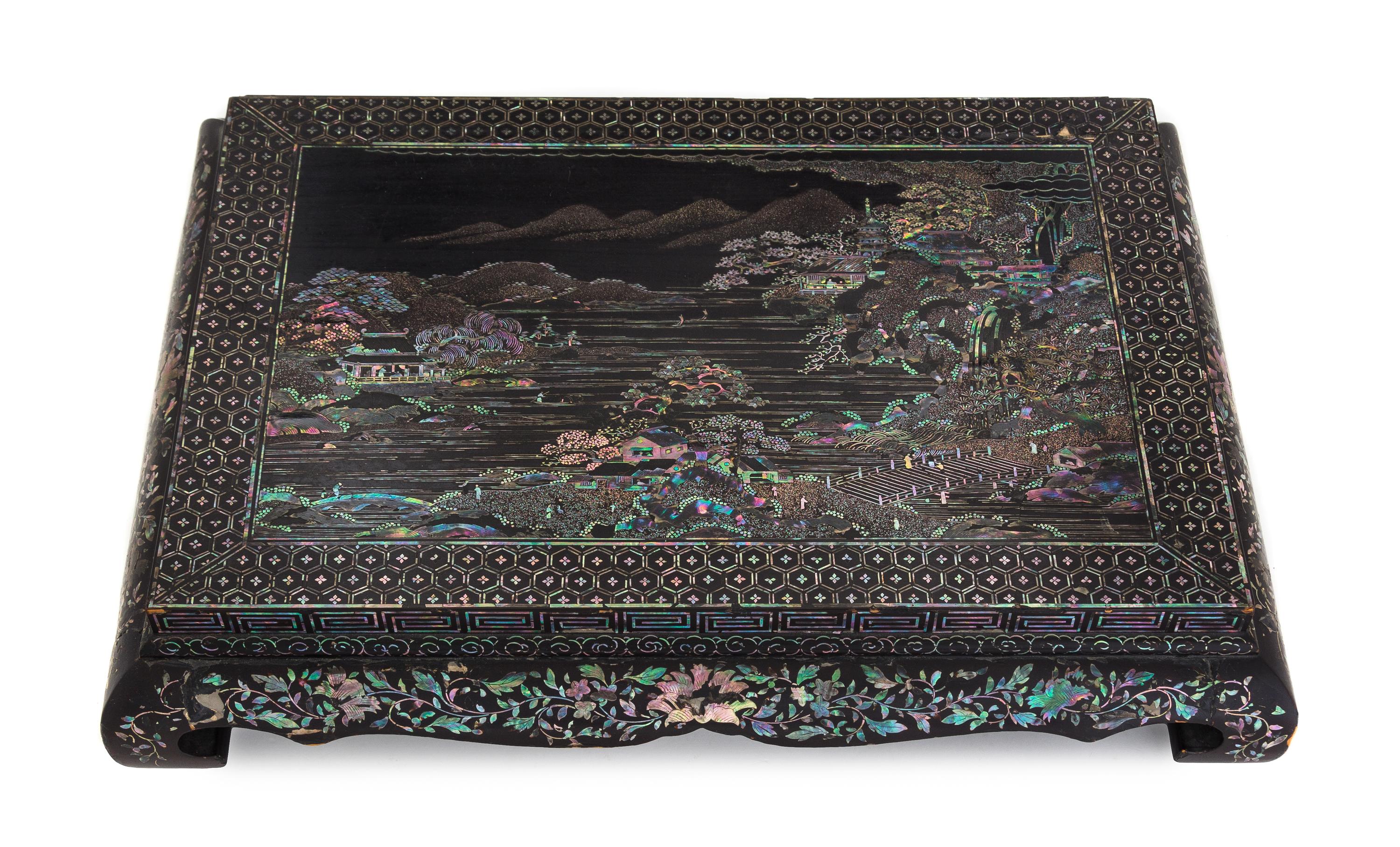 A Mother-of-Pearl Inlaid Lacquer Stand Length 18 3/4 x width 14 inches.