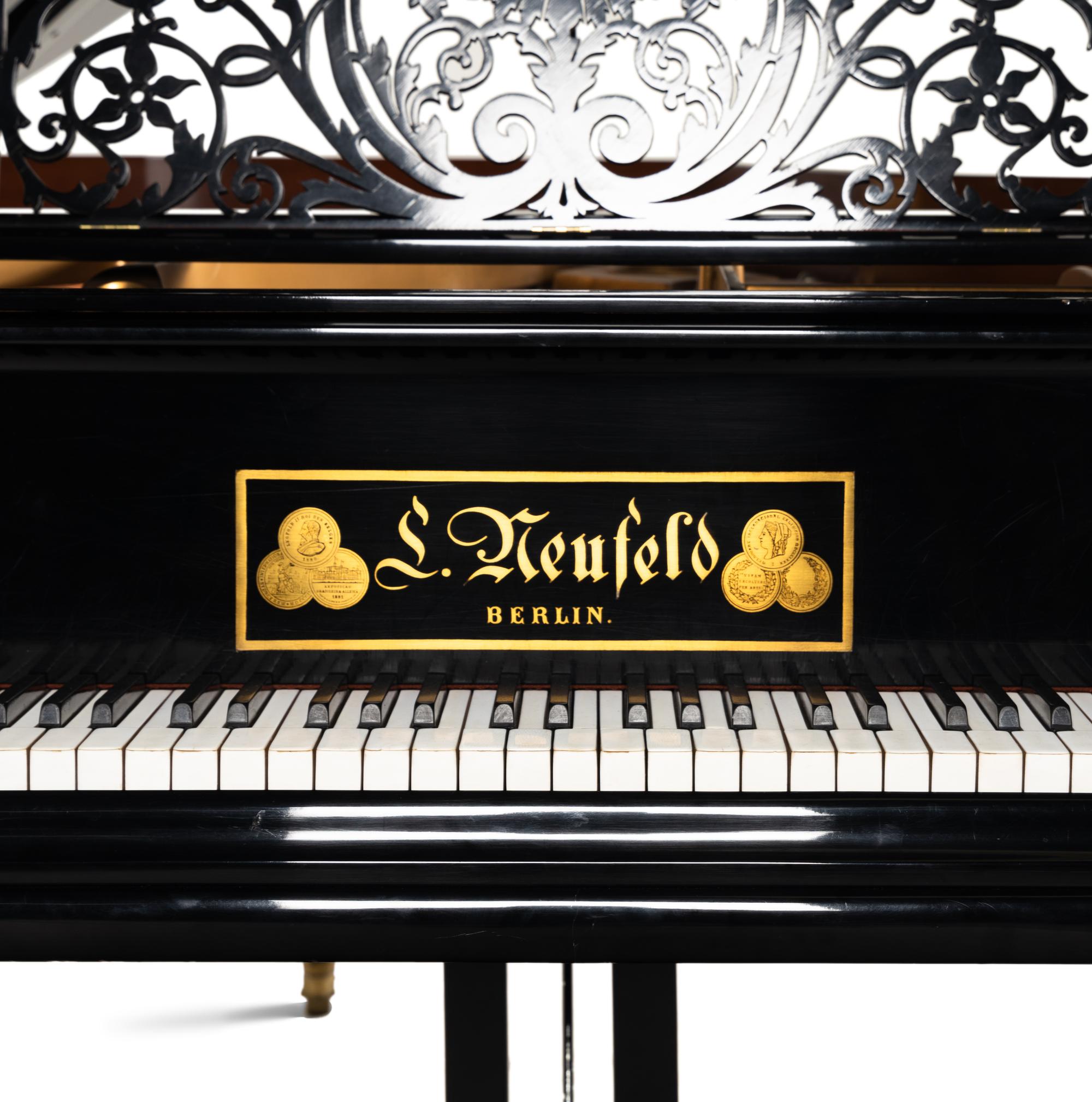 A Neufeld Black Lacquer Grand Piano