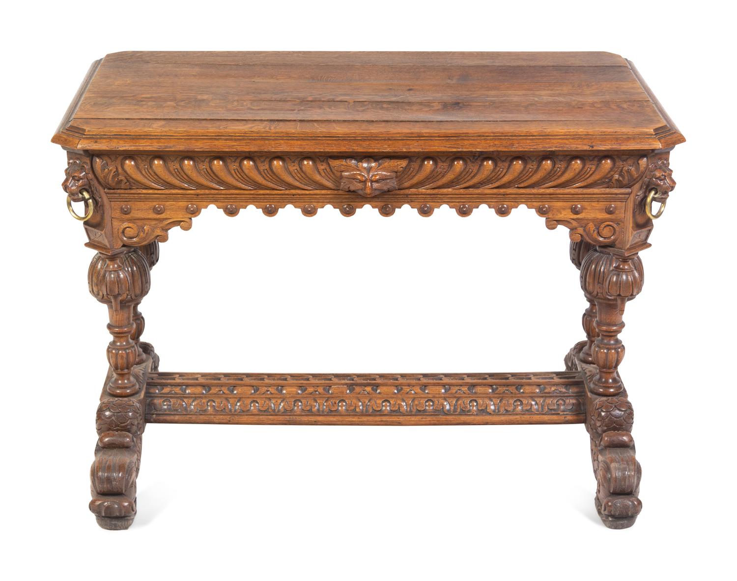 A Renaissance Revival Carved Oak Library Table in the Style of R.J. Horner