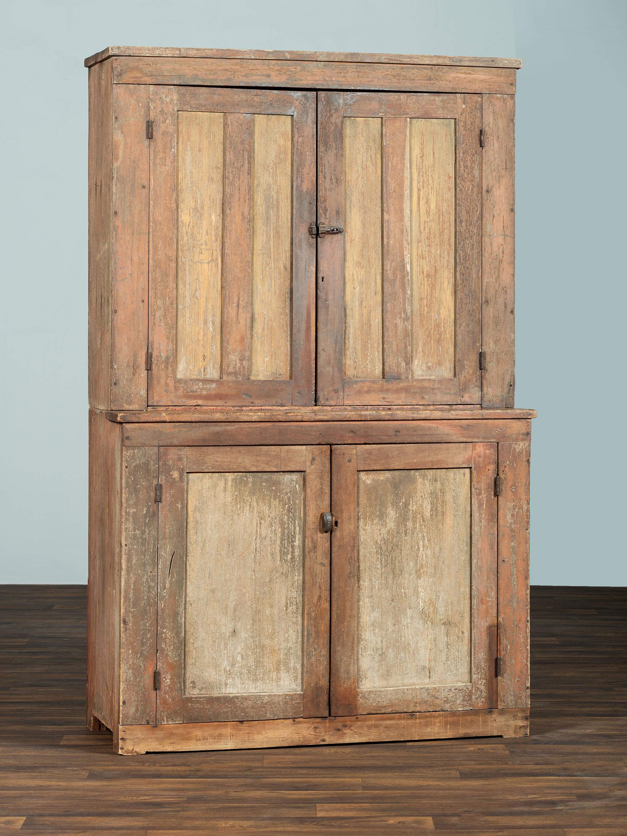 A Country Red and Yellow Painted Poplar and Cherrywood Step-Back Cupboard