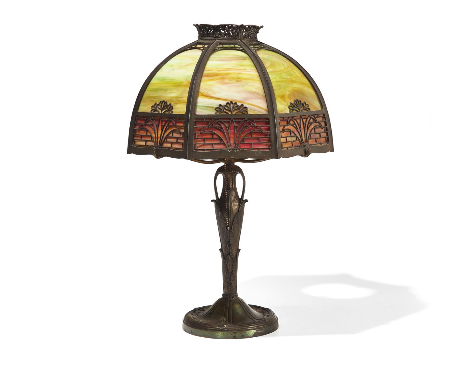 An American Arts & Crafts brass and slag glass table lamp, circa 1920