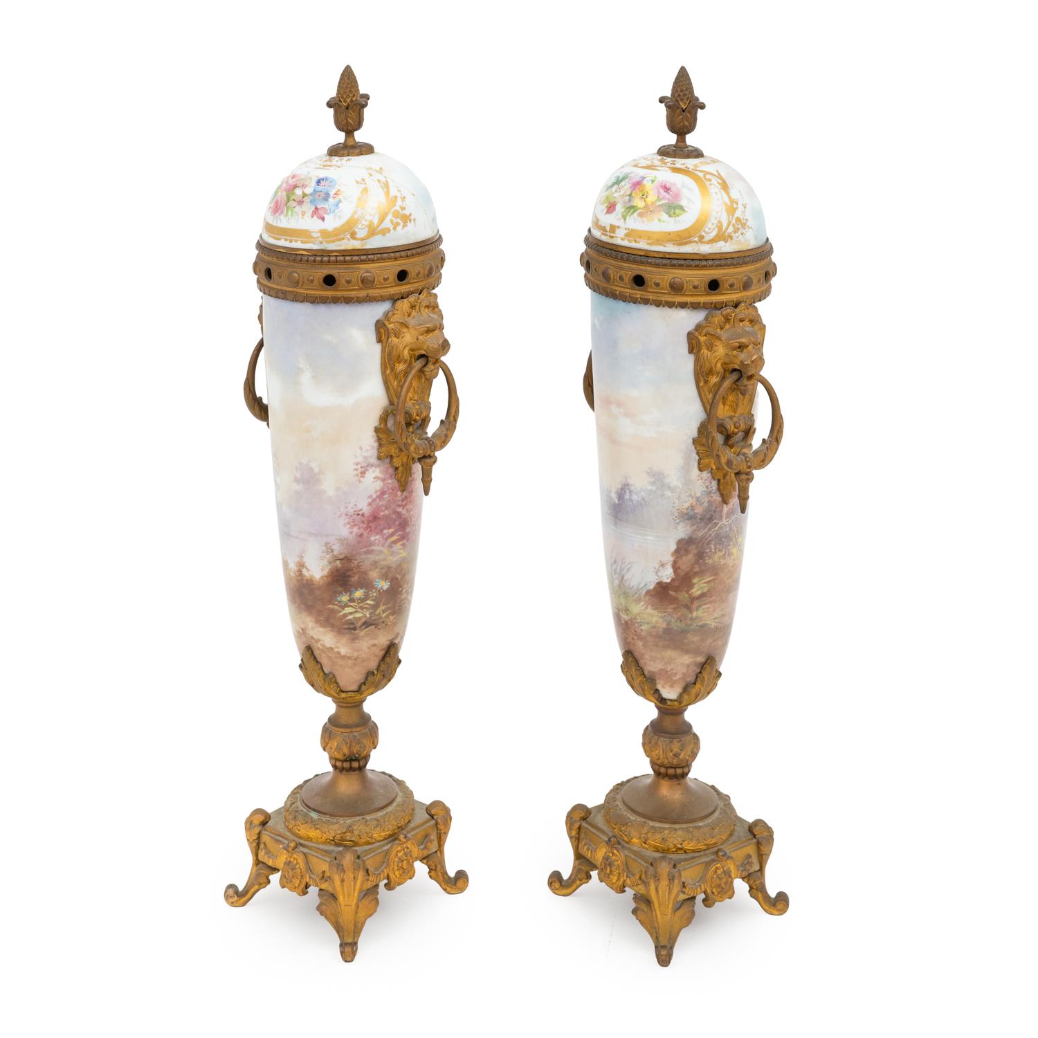 A Pair of Sèvres Style Porcelain and Gilt Bronze Mounted Potpourri Urns