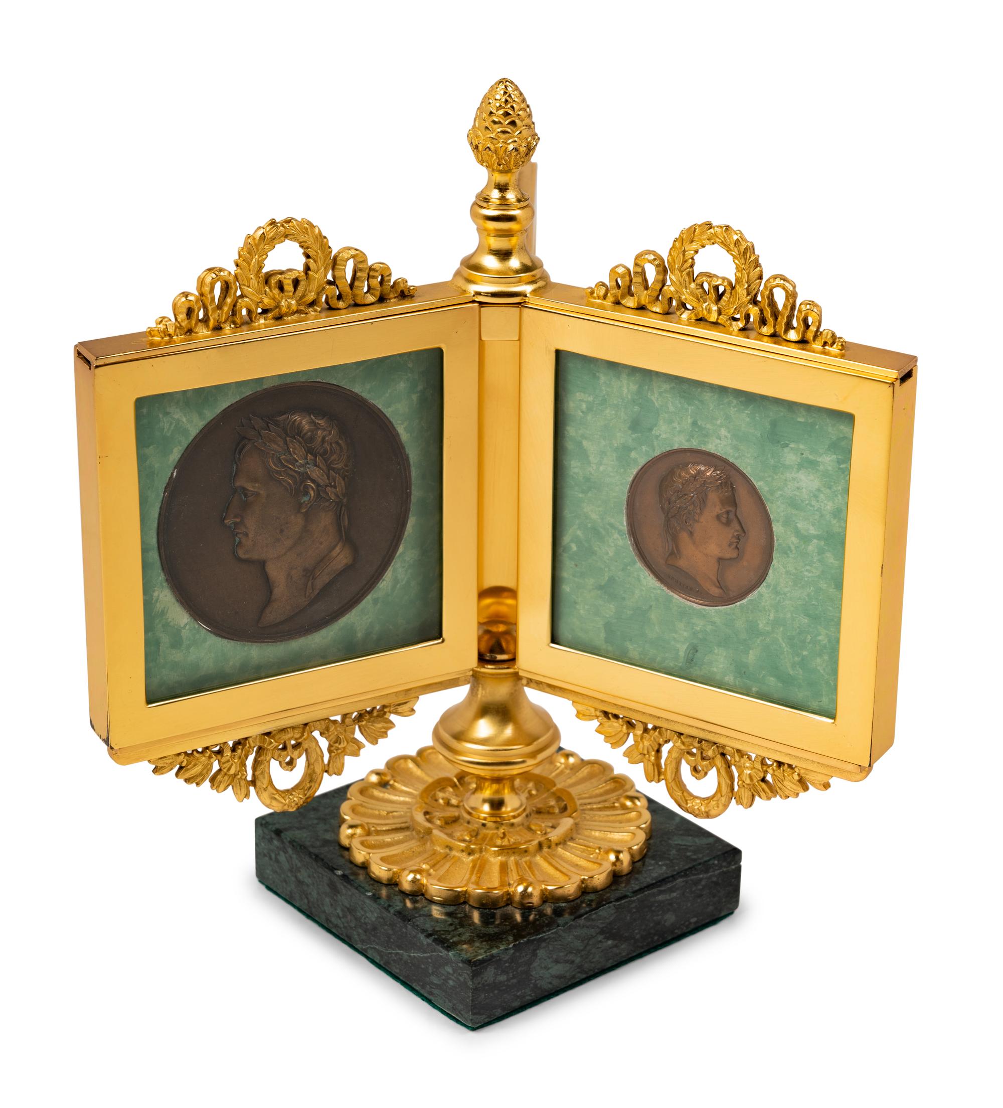 An Empire Style Gilt Bronze Tripartite Frame on Stand