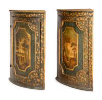 A Pair of Italian Painted Faux Marble and Parcel-Gilt Corner Cabinets