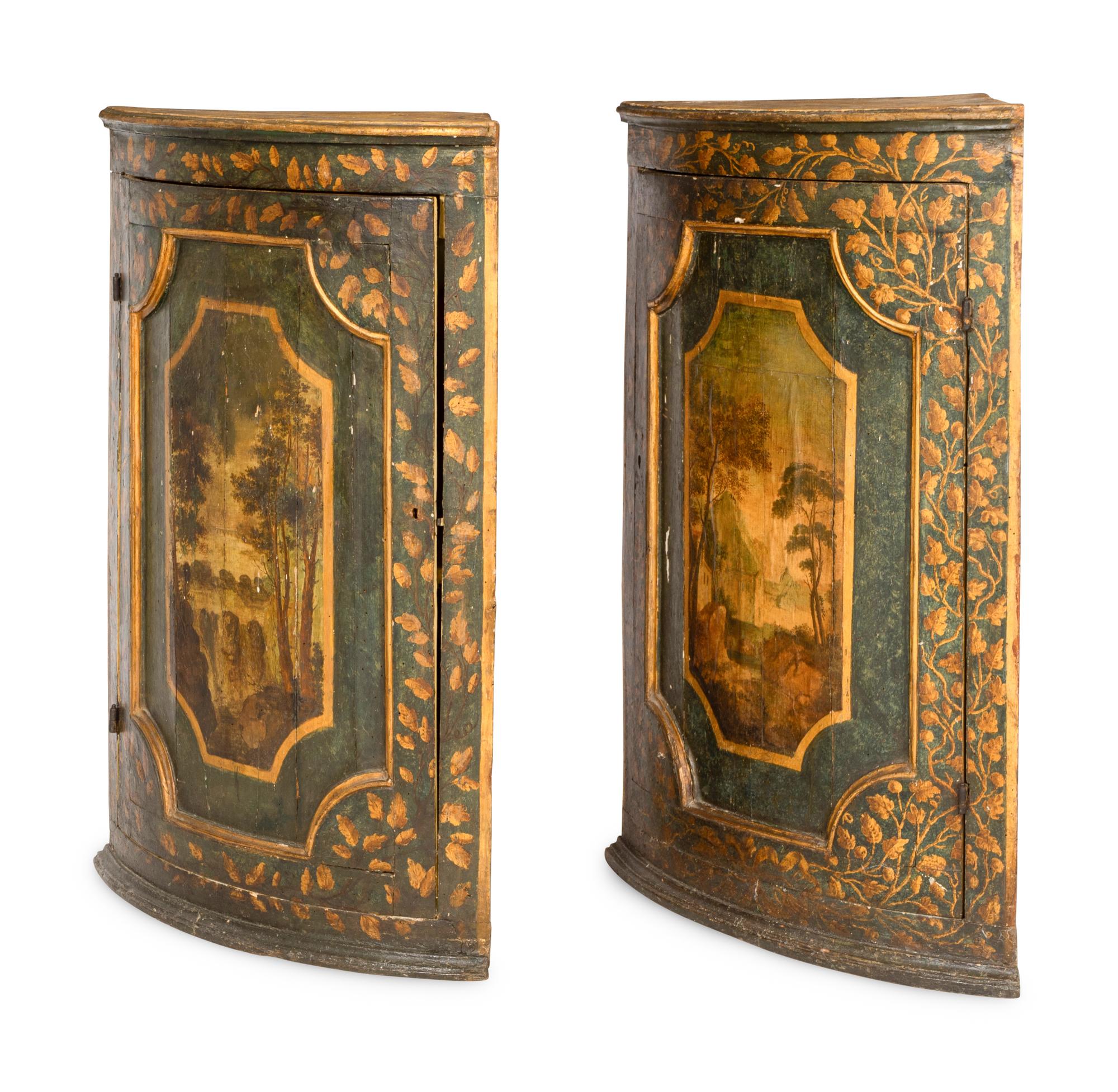 A Pair of Italian Painted Faux Marble and Parcel-Gilt Corner Cabinets