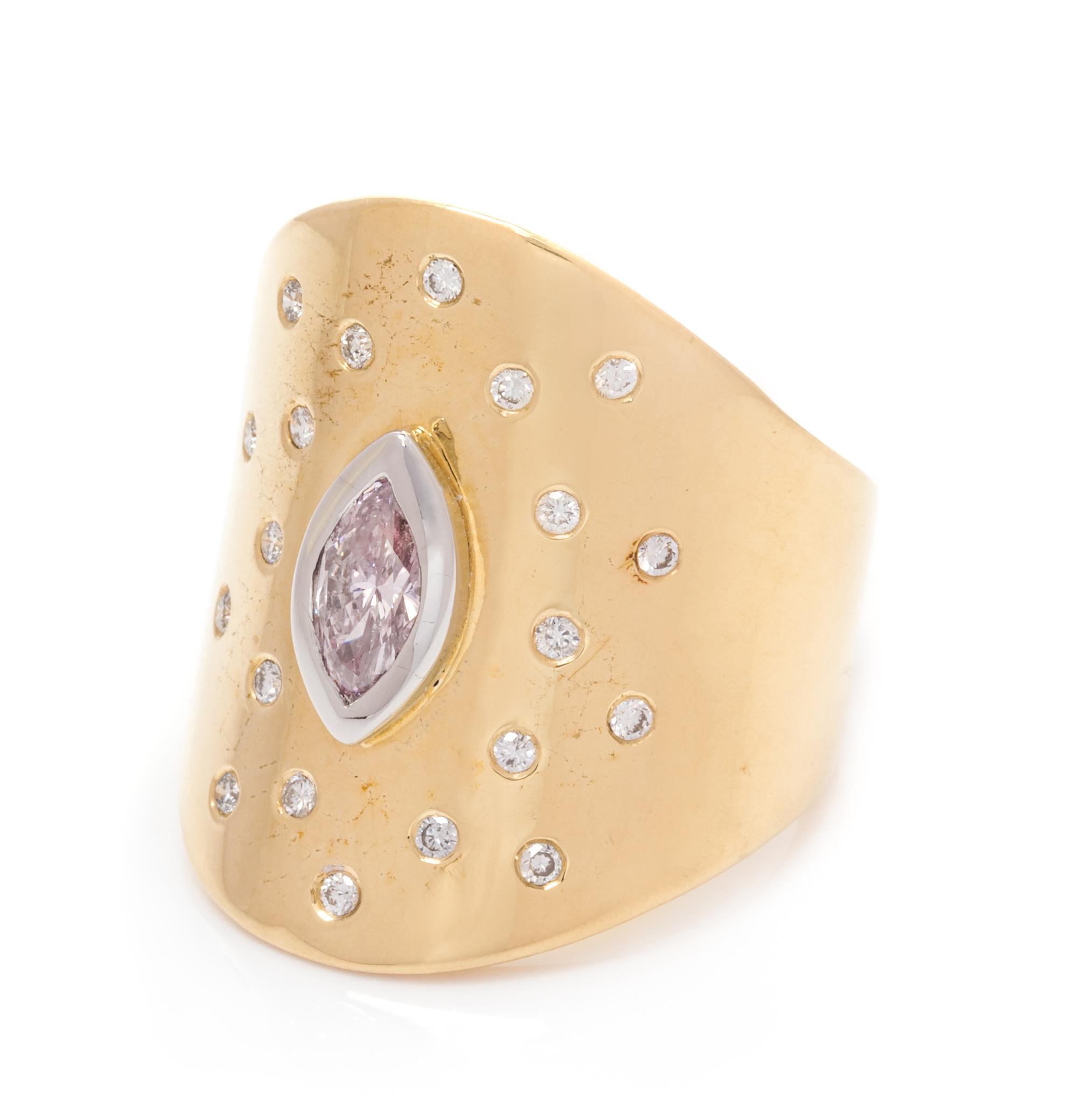 A 14 Karat Yellow Gold and Diamond Ring,