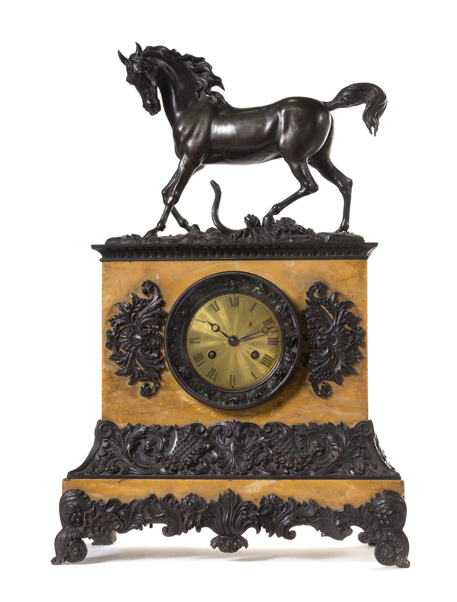 A French Bronze and Marble Mantel Clock Height 20 inches. — PARIS, 19TH CENTURY