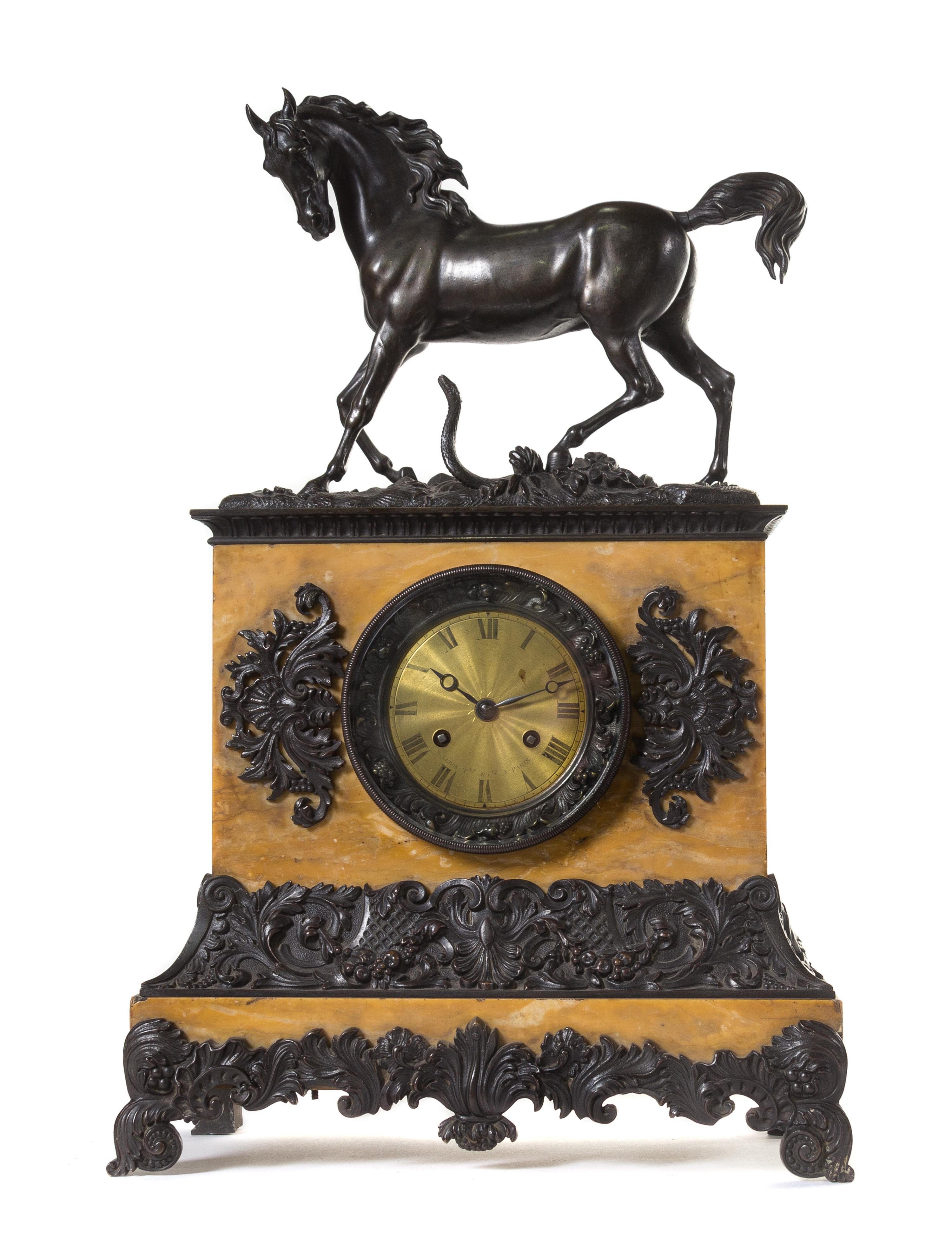 A French Bronze and Marble Mantel Clock Height 20 inches. — PARIS, 19TH CENTURY