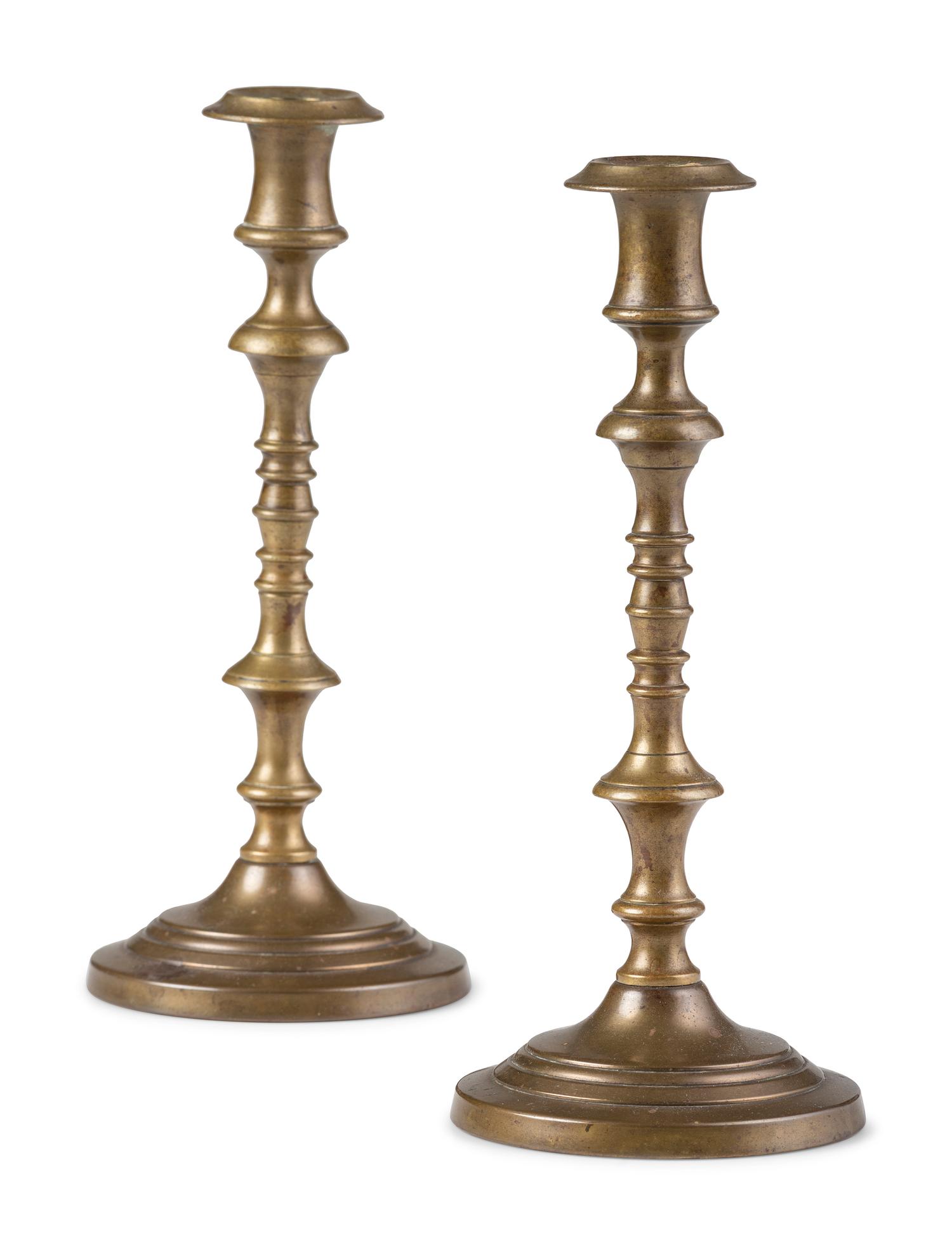 Three Pairs of English Brass Candlesticks