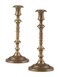 Three Pairs of English Brass Candlesticks