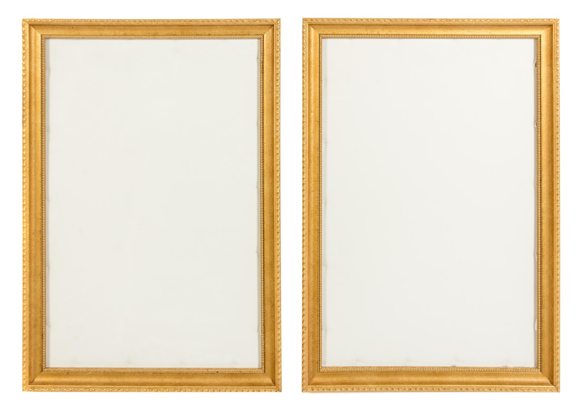 A Pair of Giltwood Frames Each 21 x 14 inches.