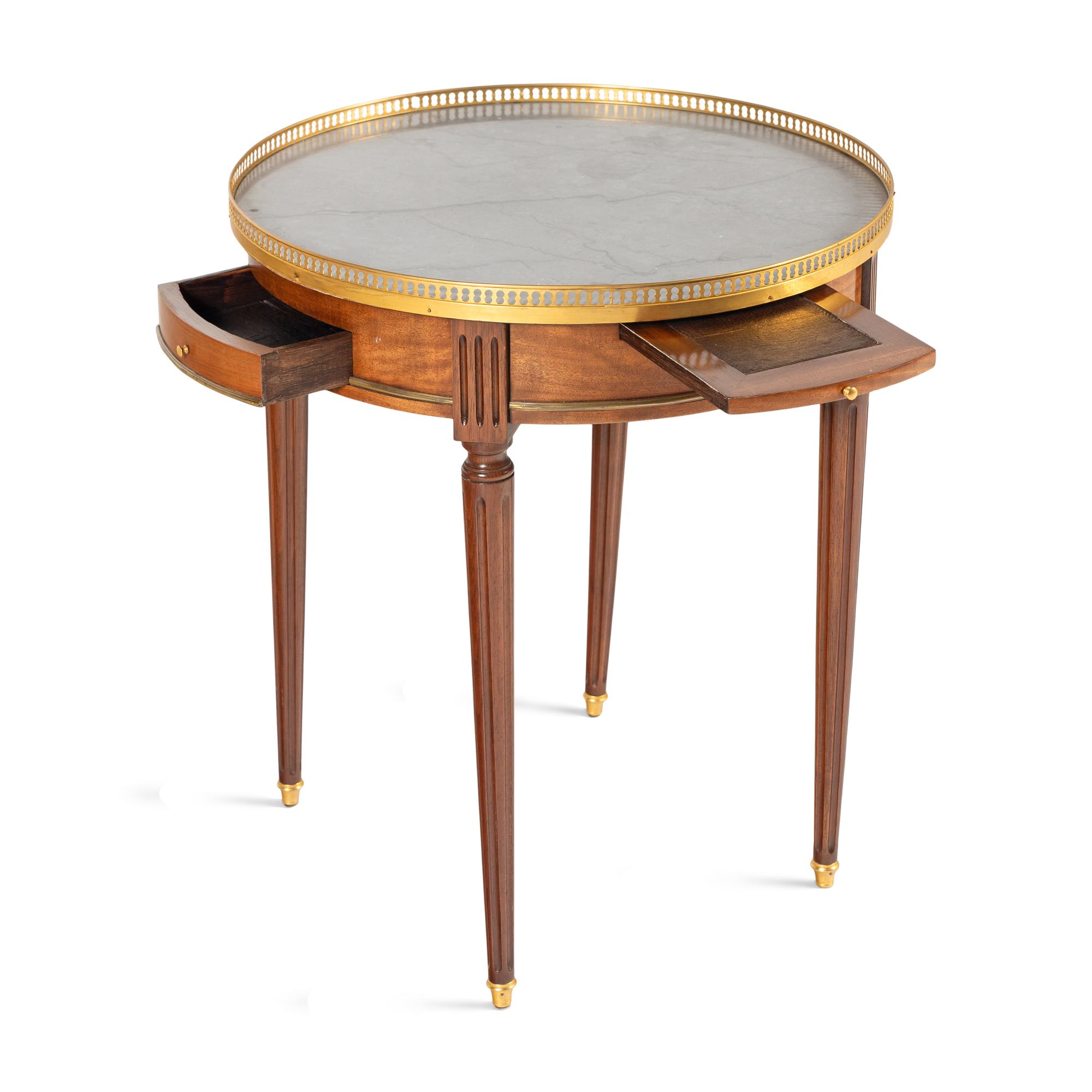 A Louis XVI Style Gilt Bronze Mounted Mahogany Bouillotte Table