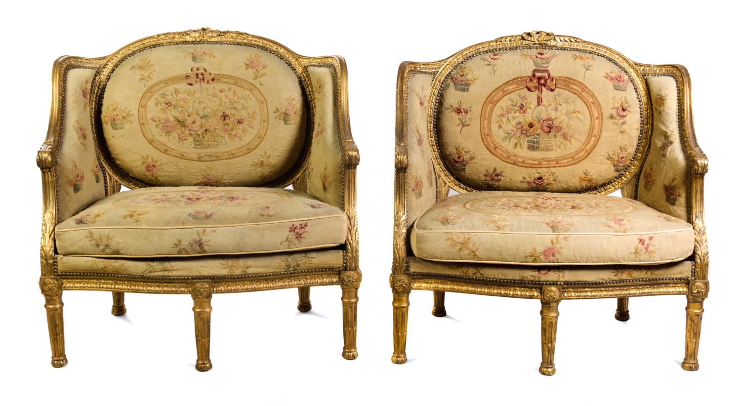 A Pair of French Transitional Style Carved Giltwood Canapes Height 39 x width 37 3/4 x depth 28 inches. — LATE 19TH CENTURY