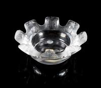 Lalique, a Saint Nicholas pattern molded and frosted glass ash receiver