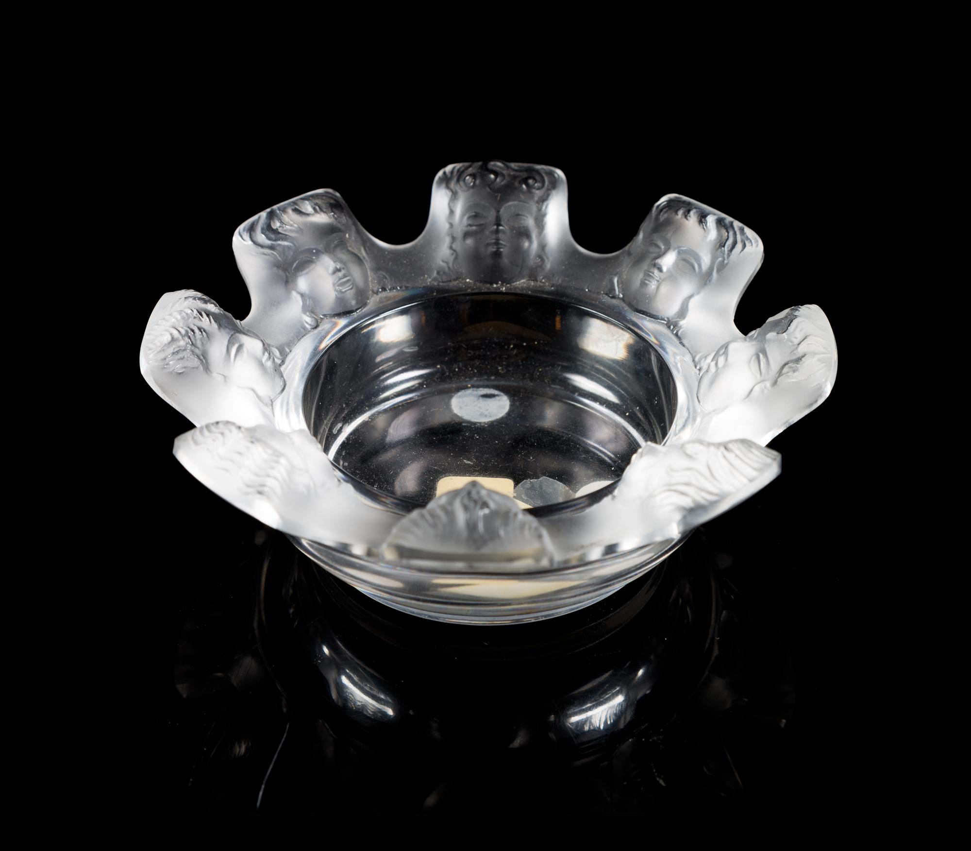 Lalique, a Saint Nicholas pattern molded and frosted glass ash receiver