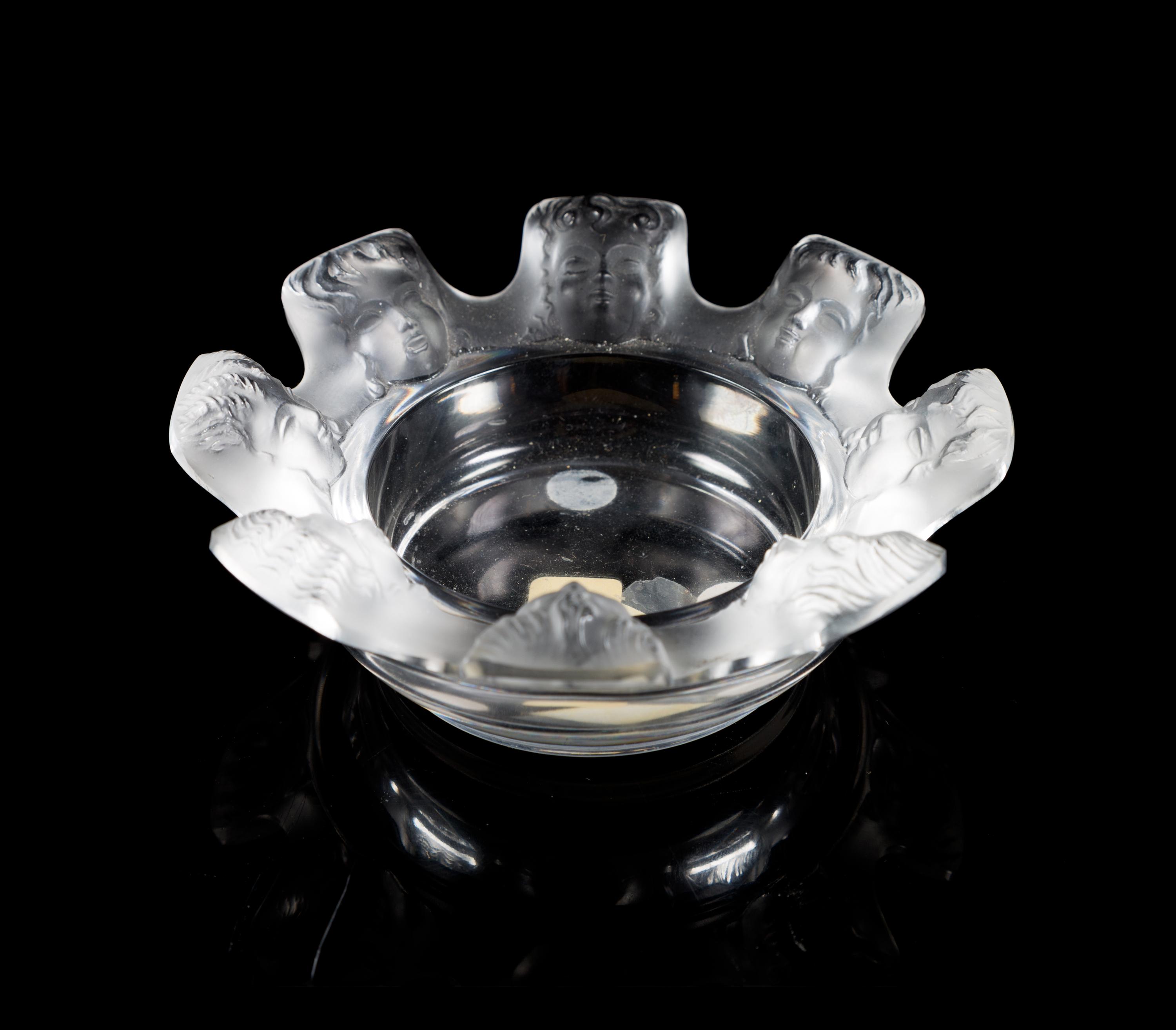 Lalique, a Saint Nicholas pattern molded and frosted glass ash receiver