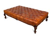 A Leather Tufted Ottoman — 20TH CENTURY