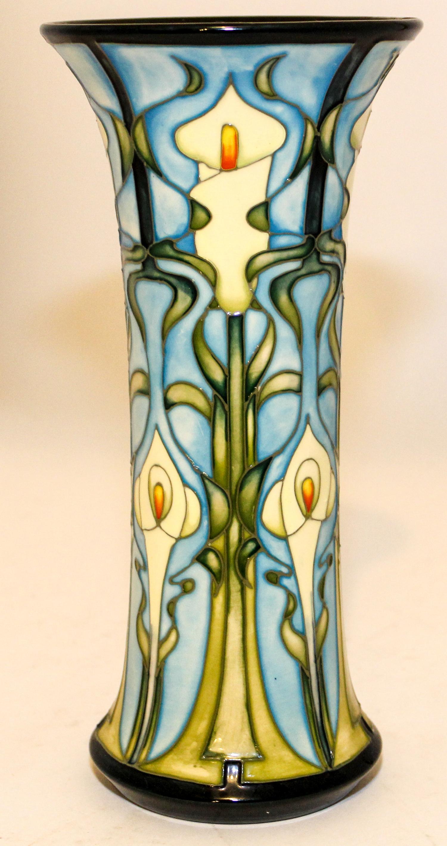 A Moorcroft Pottery Vase. Height 10 inches.
