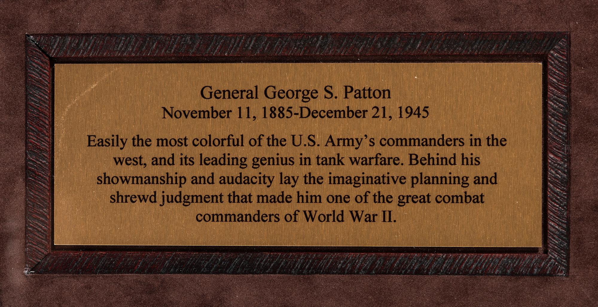 [WORLD WAR II]. PATTON, George S. (1885-1945). Garrison cap signed ("GS Patton Jr. Gen.") in presentation display.