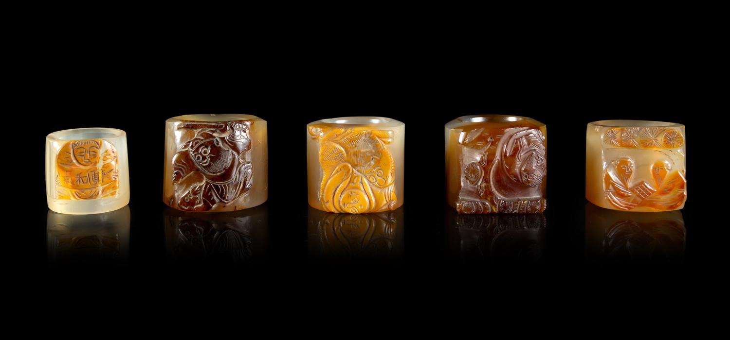 Five Carved Agate Archer's Rings