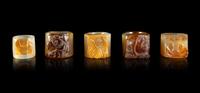 Five Carved Agate Archer's Rings