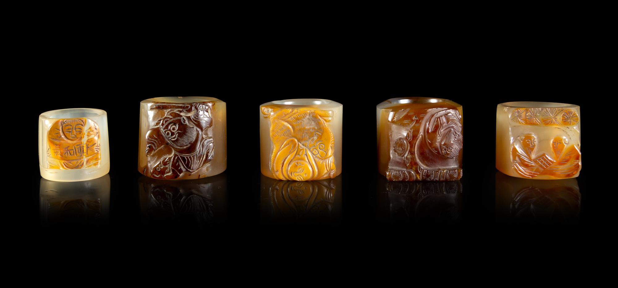 Five Carved Agate Archer's Rings
