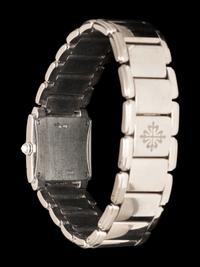 PATEK PHILIPPE, REF. 4908 18K WHITE GOLD AND DIAMOND 'TWENTY~4' WATCH