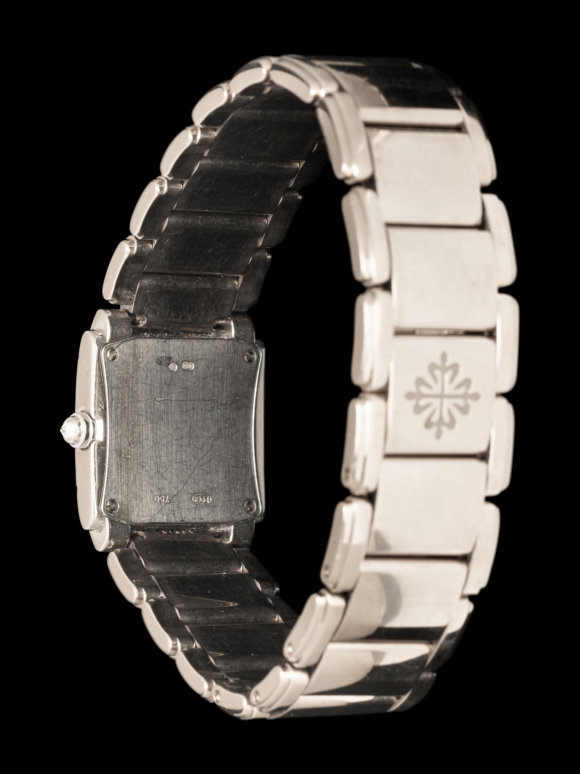 PATEK PHILIPPE, REF. 4908 18K WHITE GOLD AND DIAMOND 'TWENTY~4' WATCH