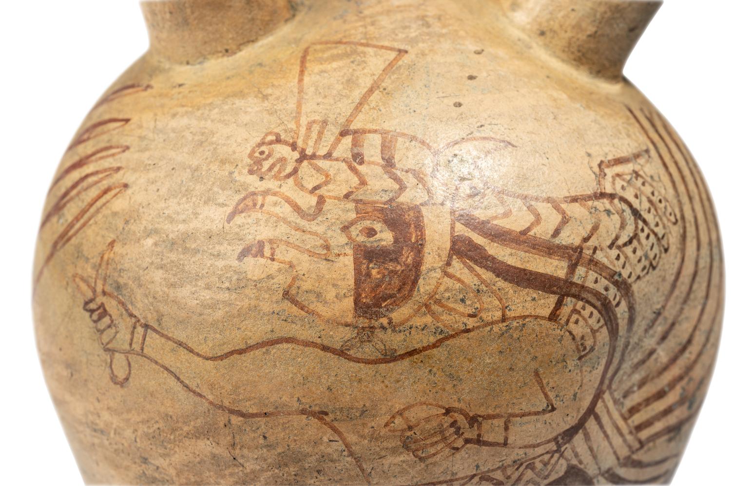 A Moche Fineline Stirrup Vessel