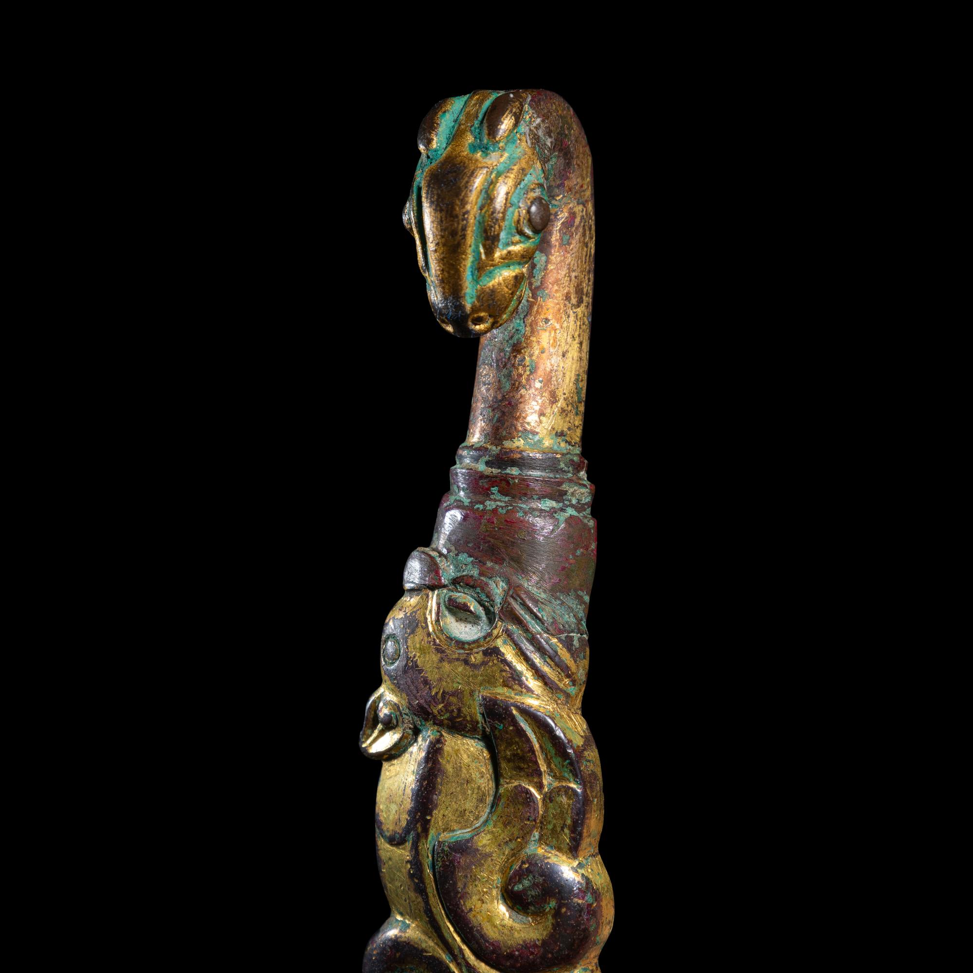 Two Chinese Gilt Bronze Belt Hooks, Warring States-Han Dynasty 戰國-漢 銅鎏金龍鳳帶鉤及鳥首帶鉤