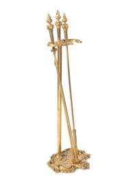 A Set of Louis XV Style Gilt Bronze Fire Tools