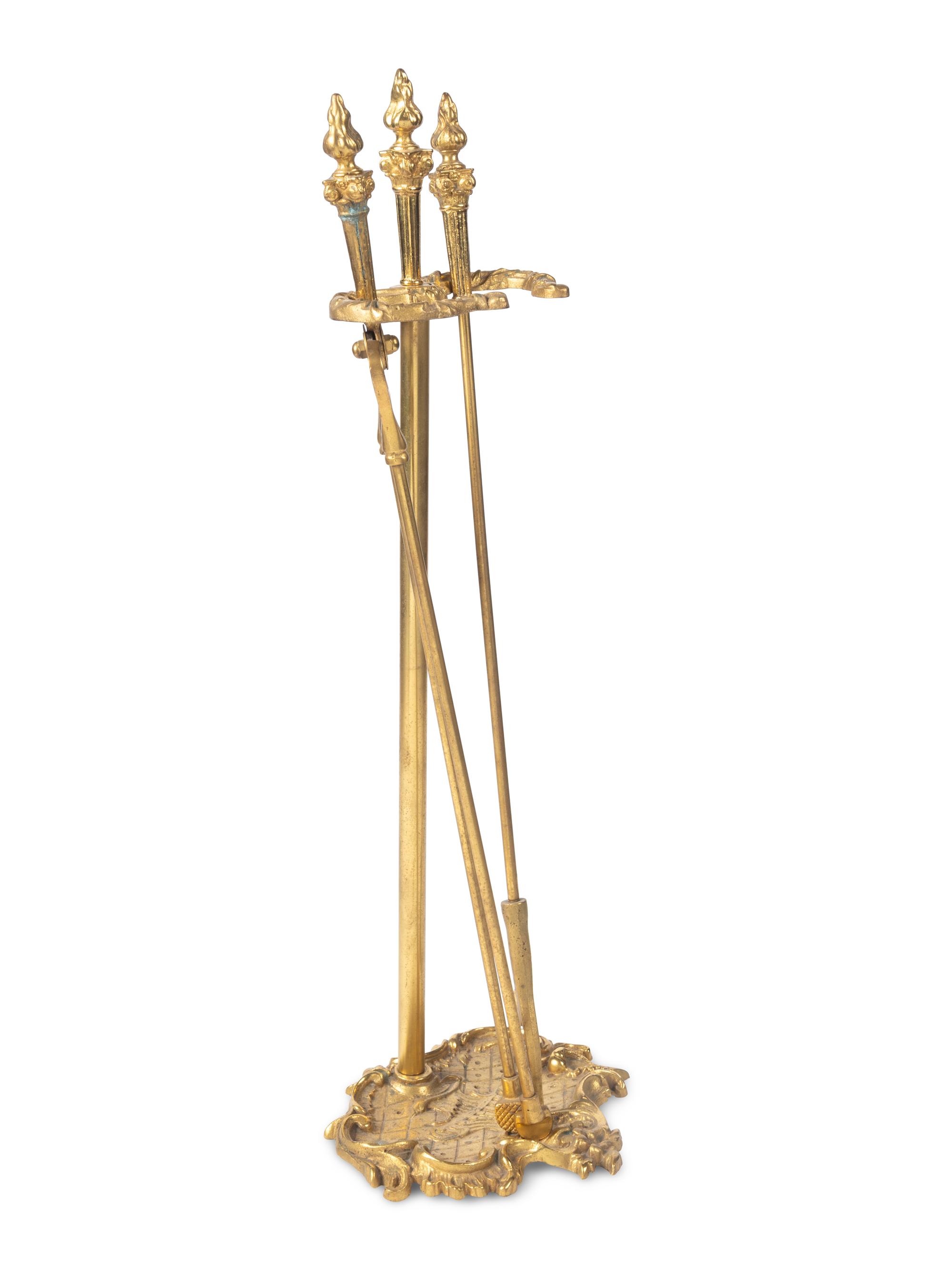 A Set of Louis XV Style Gilt Bronze Fire Tools